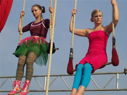 Rosie and Sally perform on the trapeze.